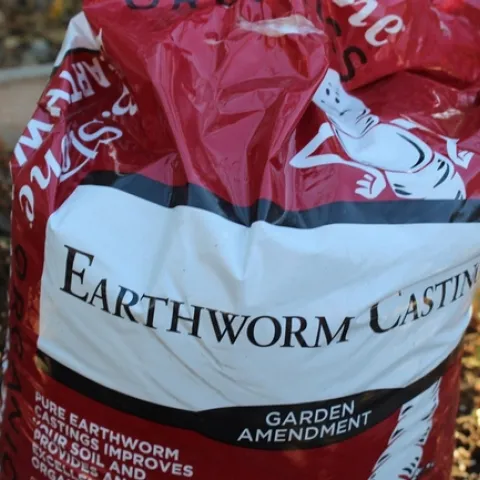 a red bag of worm castings aka worm poo