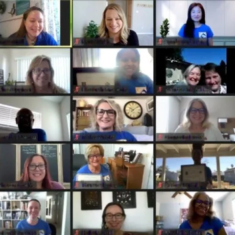 Zoom gallery view shows 25 people wearing blue shirts, smiling - some holding their UC Master Gardener Program diplomas.