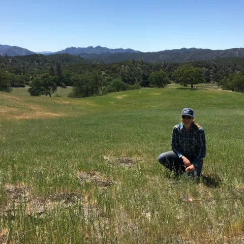 Figure 1. Liz Reikowski at a grazed plot.