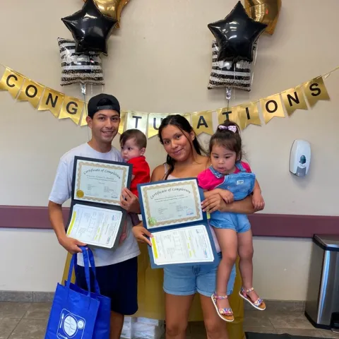 Image of CFHL, UCCE Kern Nutrition Graduates holding their certificates of completion.