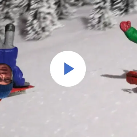 Cartoon shows Tu Tran standing on his hands sledding down a snowy slope followed by Wendy Powers on a sled.