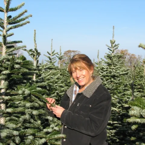 Lynn Wunderlich with Nordmann fir