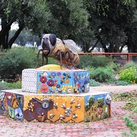 A mosaic-ceramic sculpture, Miss Bee Haven, anchors the UC Davis Bee Haven on Bee Biology Road. It is the work of self-described rock artist Donna Billick of Davis, a co-founder and founding co-director of the UC Davis Art-Science Fusion Program. (Photo by Kathy Keatley Garvey)