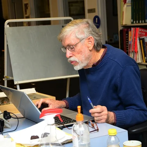 A Bohart associate for some three decades, Bill Patterson is shown working in the Bohart Museum of Entomology in 2013. (Photo by Kathy Keatley Garvey)"