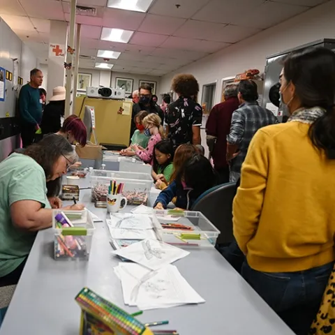 The arts-and-crafts activity at the Bohart Museum's dragonfly open house was a popular site. In the back (at left) is noted dragonfly expert Rosser Garrison of Sacramento. (Photo by Kathy Keatley Garvey)