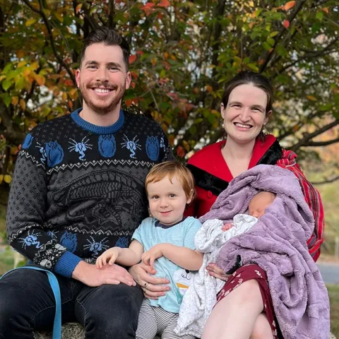 UC Davis entomology doctoral candidate Charlotte Herbert Alberts with her husband, George, son Griffin, then 2.5, and Marcy, then a week old. (Image taken Oct. 28, 2022)