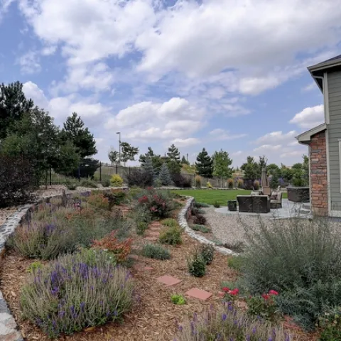 There are several easy strategies to help prepare your home landscape for wildfire. Pictured here you see gravel hardscape, a non-combustible material, within the first five feet of a home. Source: www.readyforwildfire.org.