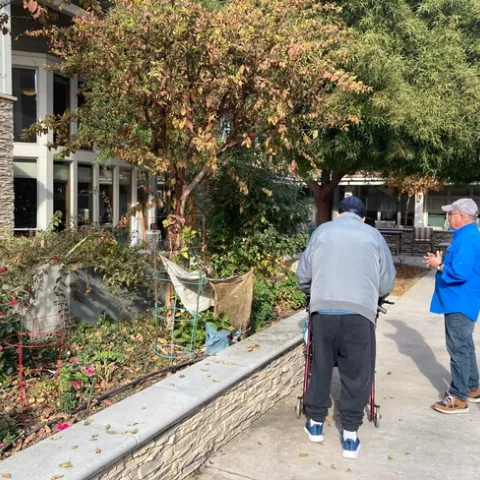 MG Charlie Hindes, right, talks to a World War II and Korean War veteran who maintains this garden at the Veterans' Home in Fresno. (Photos: Jeannette Warnert)