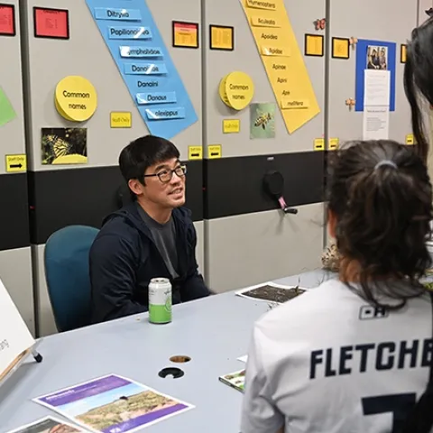 Community ecologist Louie Yang, professor, UC Davis Department of Entomology and Nematology, answers questions at a Bohart Museum of Entomology open house on "Monarchs and Milkweed." (Photo by Kathy Keatley Garvey)