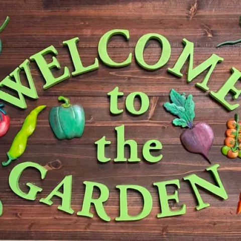 This sign created by Kathy Mahannah welcomes visitors to the community garden at St. Timothy's Church in Gridley. Grace Mahannah