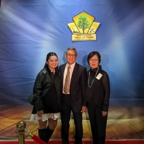 A family with a wife and husband with their daughter.