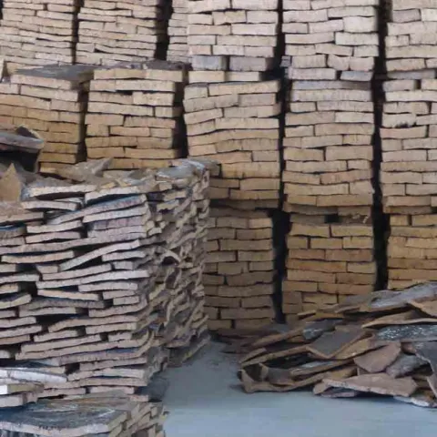 Cork sorted into piles in Alentejo, Portugal cork factory. J.C. Lawrence