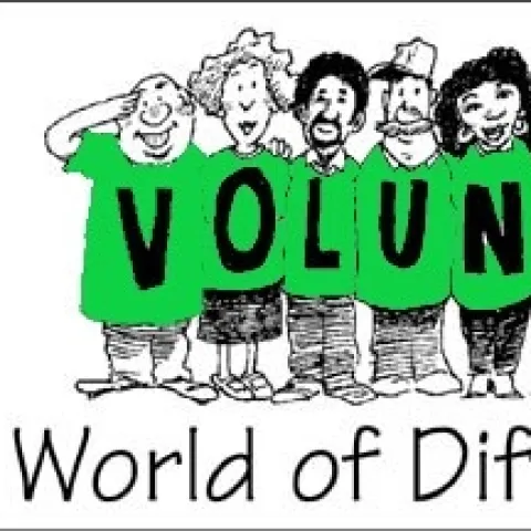 4H Volunteers With Banner