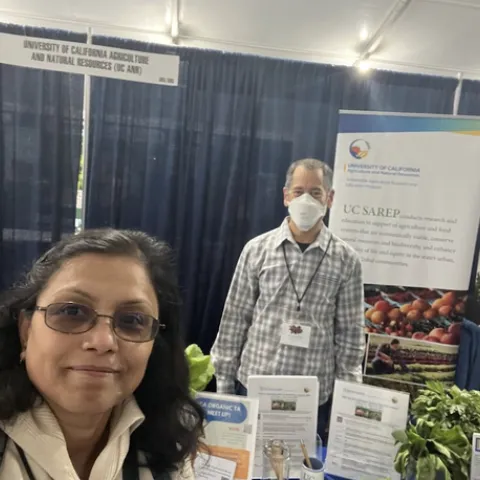 Srabani Das took a selfie at EcoFarm with Phillip Fujiyoshi, UCCE small farms community educator.