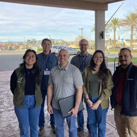 UC ANR colleagues smile for a group photo during a regional academics meeting