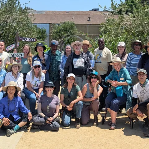 Master gardener volunteers pose for a group photo after an educational volunteer project