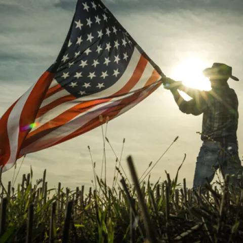 farmers with American flag