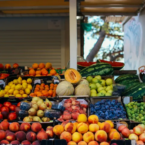 A variety of colorful produce at an outdoor market