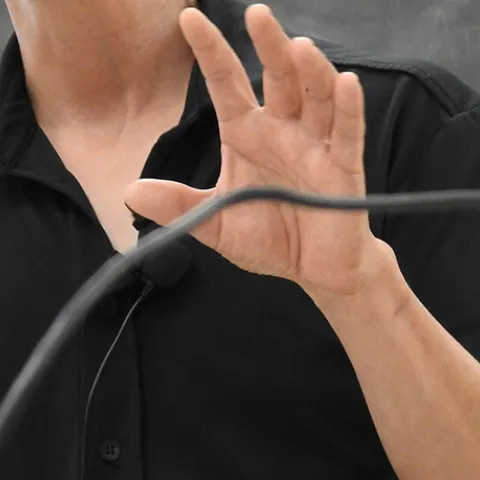 Speaker delivering a talk. (Photo by Kathy Keatley Garvey)