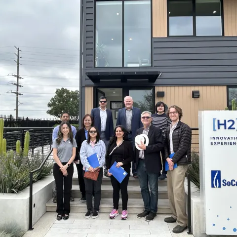 Tour group gathers in front of the SoCalGas Hydrogen Home.