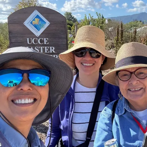 A Master Gardener with garden fair visitors