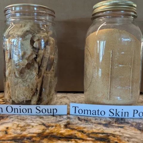 Freeze dried french onion soup and tomato skin powder in separate glass jars