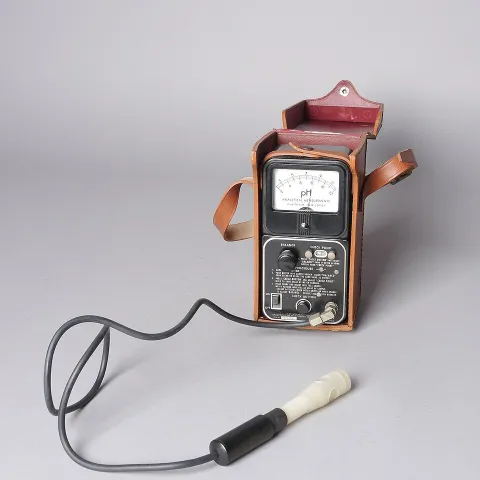 a pH meter with a white background.