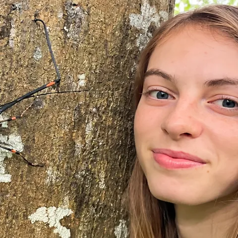 wen Erdosh, with a Harlequin beetle, one of her favorite beetle species. This image was taken in Peru. "Gwen is one of those students who instantly shows you her enthusiasm and enjoyment of entomology and it is just this kind of person who we hope will continue in this important field of science," said entomologist Jeff Smith, who curates the Bohart Museum's Lepidoptera collection. "For those of us looking ahead at the oncoming 'golden years' we need to ensure that there will be competent young scientists w