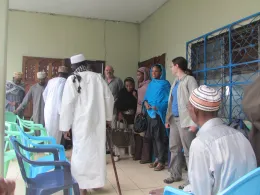 Preparing to meet chief and village elders, Comoros