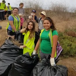 ...Service through beach clean-ups
