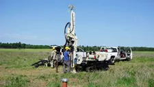 Measuring K with the direct-push permeameter. Photo by Alex Kendrick.