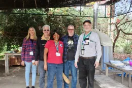 Master Gardeners with visitor