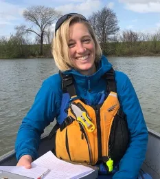 Doctoral student Ann Holmes studies what insects bats eat.