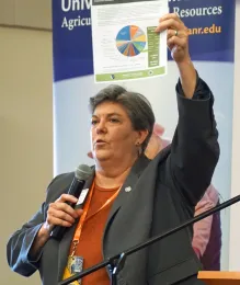 UC ANR vice president Glenda Humiston shares information about the value of working landscapes at the UC ANR reception.