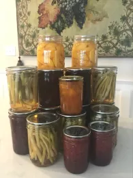Canned garden produce in jars.