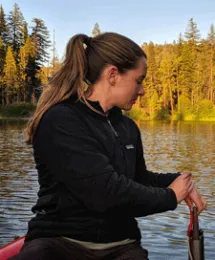 Dr. Adrianne Smits prepares to deploy an instrument in a lake in Yosemite National Parks. Photo by S. Sadro.