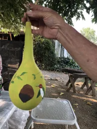 Gourds getting painted.