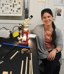 UC Davis graduate student Jennifer Cribbs of the Graduate Program of Environmental Policy and Management, awaits visitors. (Photo by Kathy Keatley Garvey)