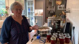 Linda making strawberry jam
