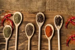 Wooden spoons with dried spices