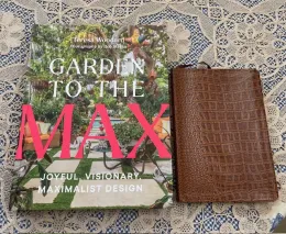 garden to the max book and a brown journal