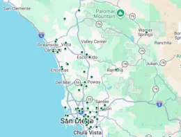 Aerial map of San Diego County with red dots where community gardens are located.