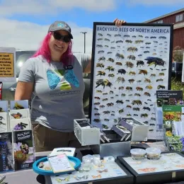 Educational booth from the Xerces Society with information about bees and other insects