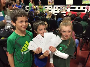 Students showing off awards they earned for their entry’s at farm day