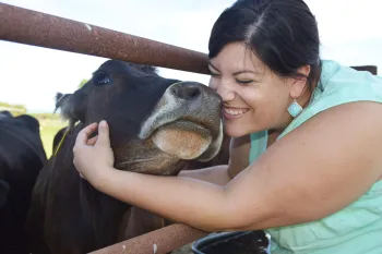 Lindsey Affonso and a cow
