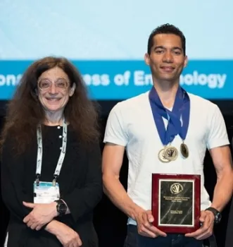 Ralph Washington Jr. captained the UC Davis team to a national championship in 2016 and 2015. Here he's pictured with May Berenbaum, ESA president in 2016. Washington captained the UC Berkeley-UC Davis Linnaean Team that won the Pacific Branch championship. The team will now compete in the ESA national championships in November.(Photo by Chuck Fazio)