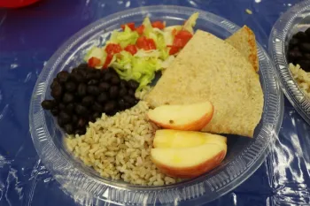 Judges plate of beans, rice, tortillas