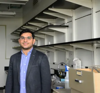 Shahid Masood Siddique in front of his lab being renovated. (Photo by Kathy Keatley Garvey)