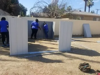 Job Corps youth assembling the garden shed