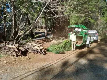 BCFSC at work with wood chipper, Lauren de Terra